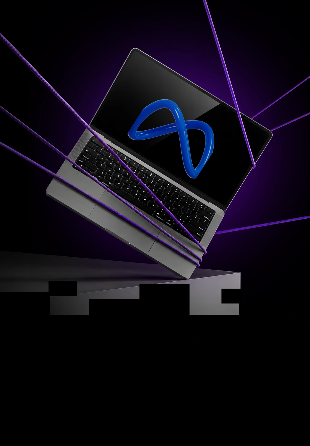 Laptop displaying the Meta logo, wrapped in cord
